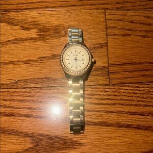 Women’s gold fossil watch